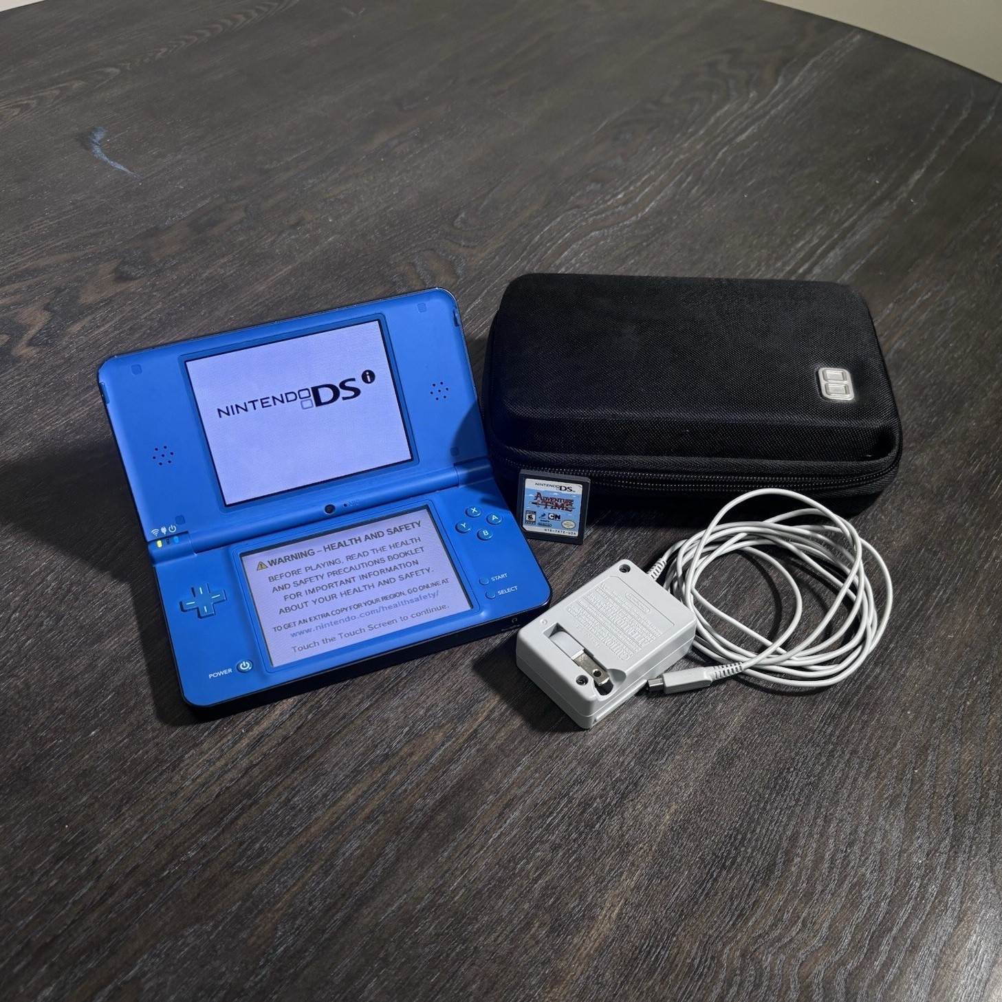 Nintendo DSi XL Bundle [used] (Console w/Charger, Case & Adventure Time Game)