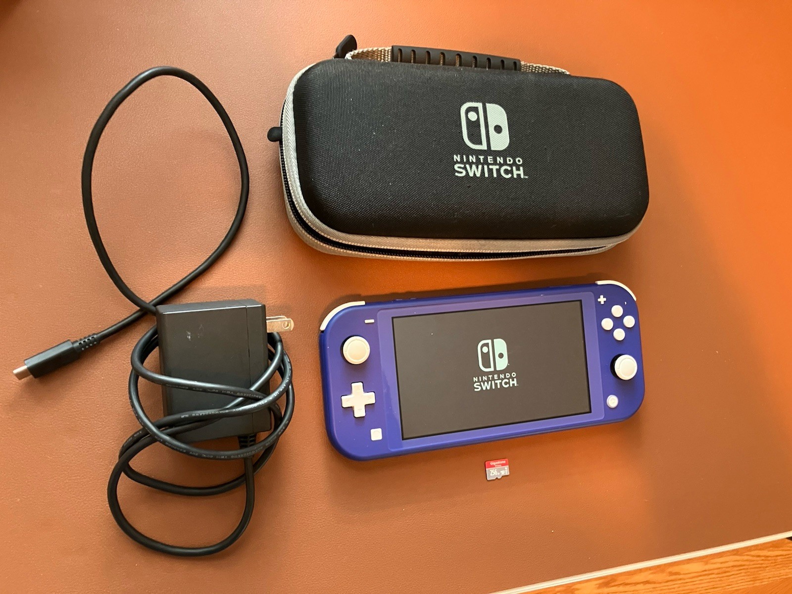 Nintendo Switch Lite with 256GB Micro SD Card Case and Charger. Great Condition