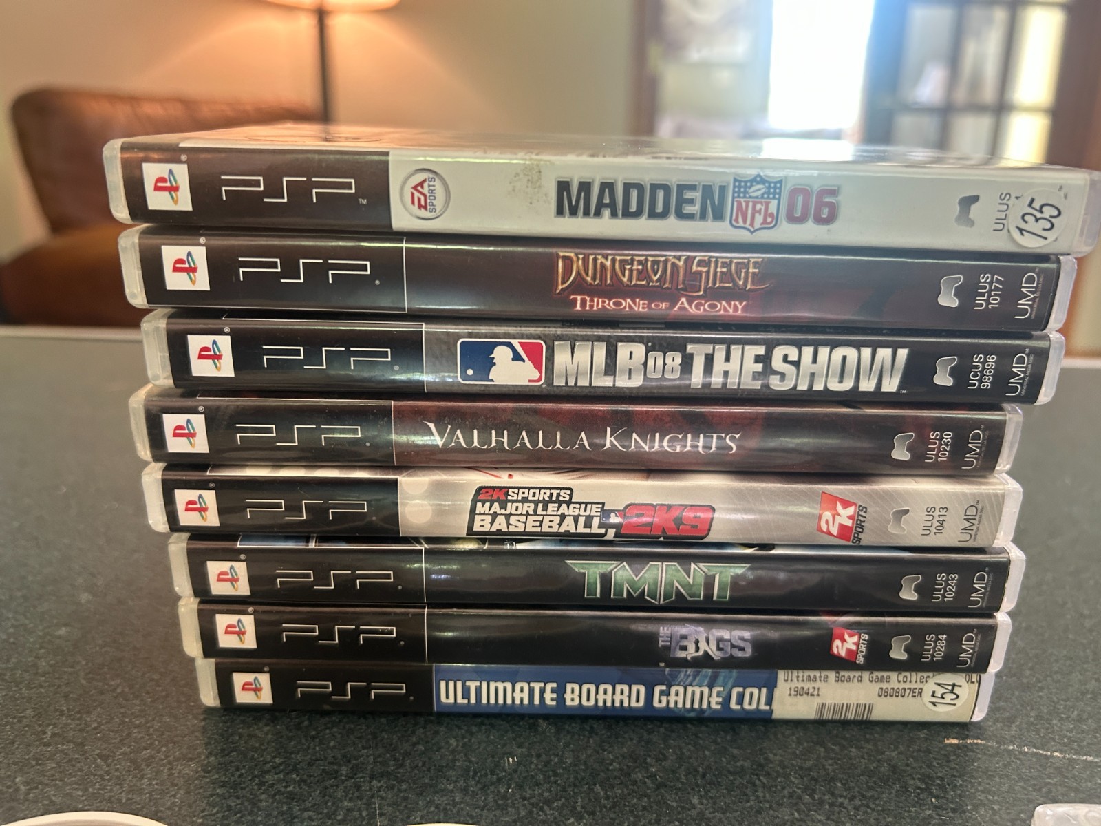Sony PlayStation Portable console PSP-1004 with 8 games & 3 memory sticks