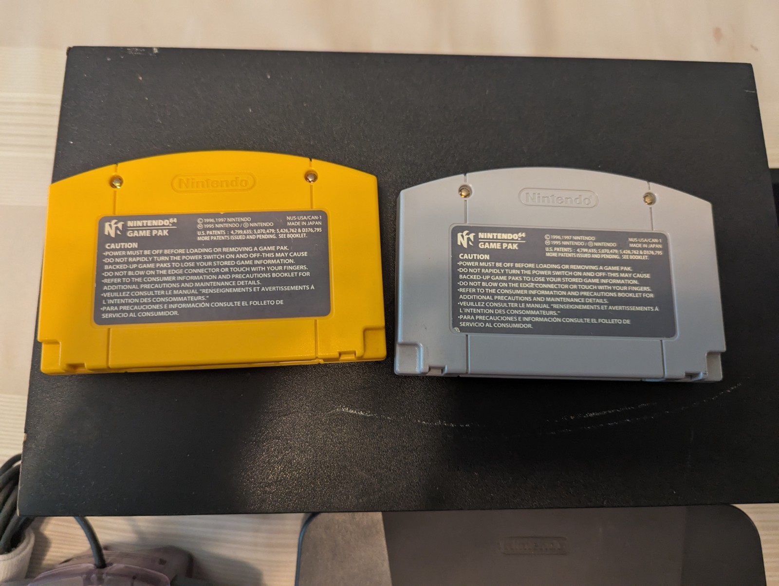 Nintendo 64 black.Purple Translucent Controller And 2 Games and case