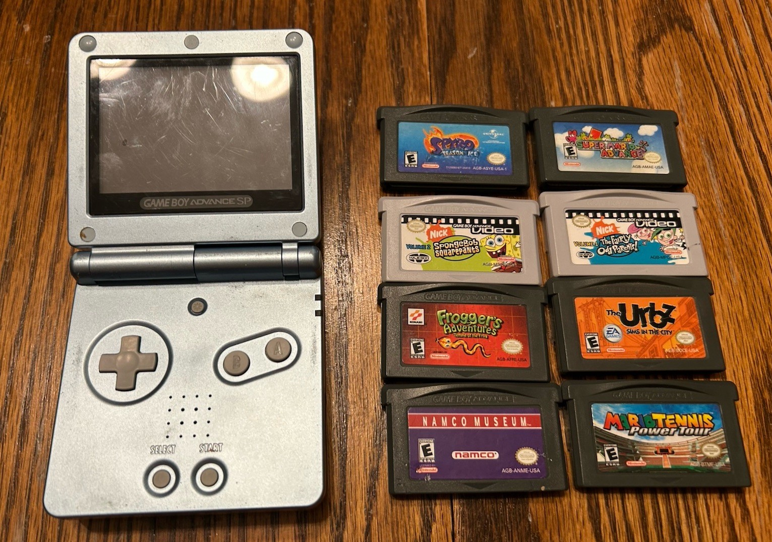 Nintendo Game Boy Advance SP Light Blue AGS-101 with Games Urbz Mario
