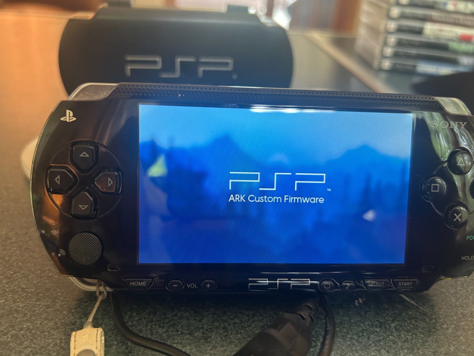 Sony PlayStation Portable console PSP-1004 with 8 games & 3 memory sticks